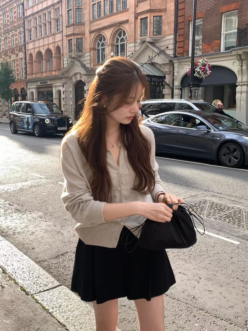 Round wholegarment cardigan