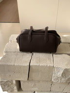 Bow shoulder bag