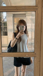 Round pleats sleeveless