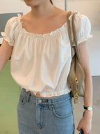 Off shirring blouse