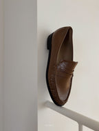 Glossy penny loafer
