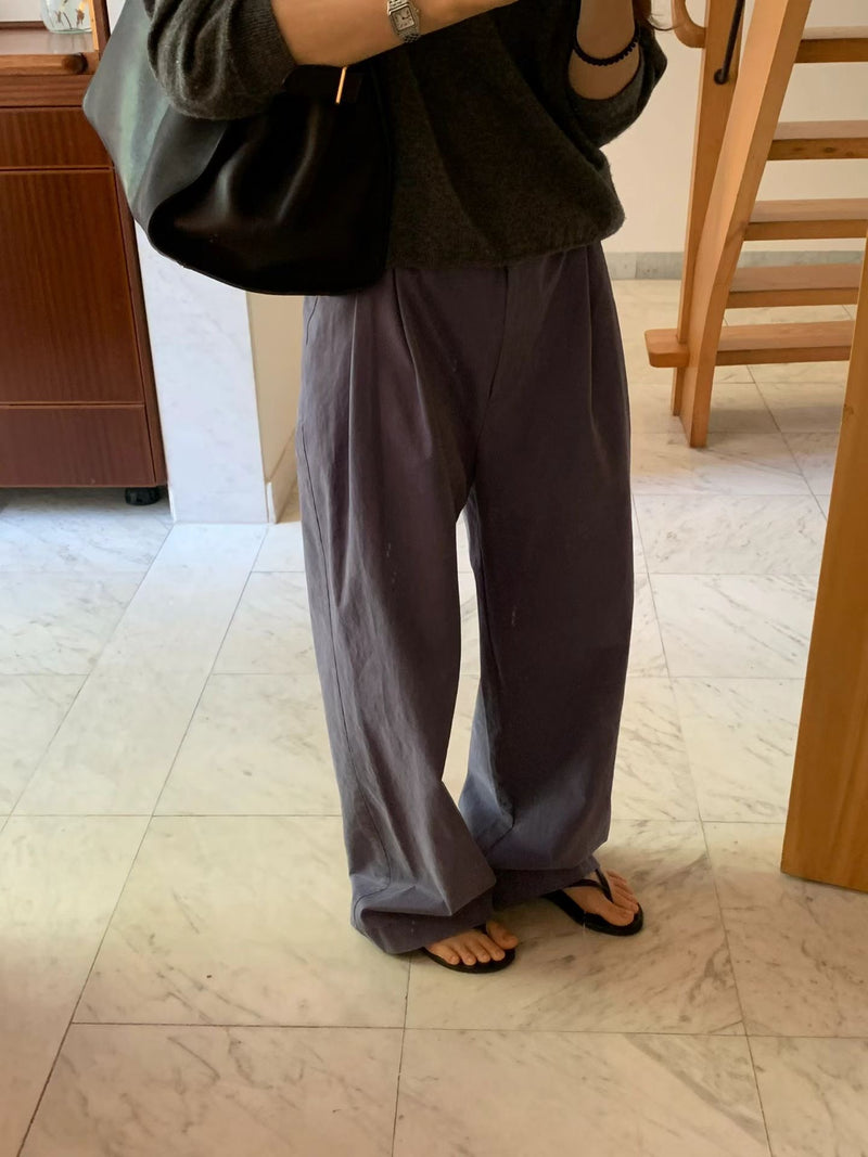 Aging double tuck pants