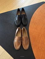 Glossy penny loafer