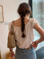 Off shirring blouse