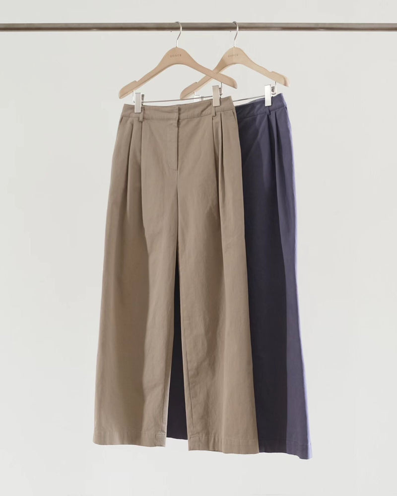 Aging double tuck pants